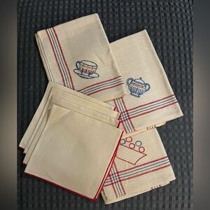 Vintage 7 piece linen set. Delicate hand embroidered designs.